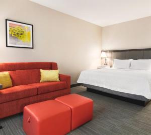Postel nebo postele na pokoji v ubytování Snoqualmie Inn by Hotel America