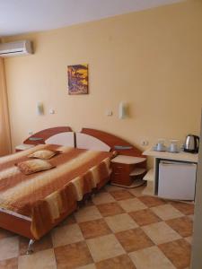 Cama o camas de una habitación en VENIS hotel