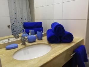 Et badeværelse på Departamento con Terraza R&M