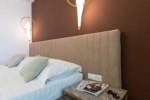 Ein Bett oder Betten in einem Zimmer der Unterkunft Bošket Luxury Rooms