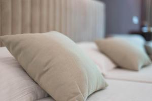 Ein Bett oder Betten in einem Zimmer der Unterkunft Bošket Luxury Rooms