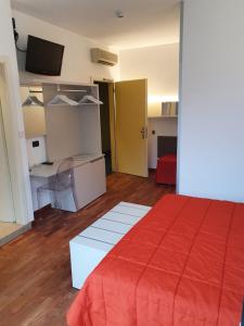 Postel nebo postele na pokoji v ubytování Hotel Internazionale