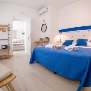 Postel nebo postele na pokoji v ubytování Donna Maria b&b