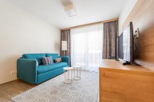 TV/trung tâm giải trí tại Feldberg Lodge Holidays - Residenz Grafenmatt