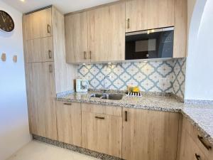 Kuchyňa alebo kuchynka v ubytovaní Bahia 46 Apartments Casasol