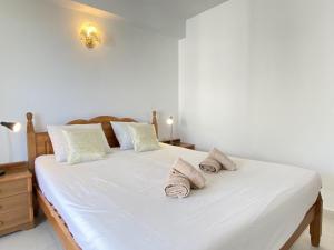 Posteľ alebo postele v izbe v ubytovaní Bahia 46 Apartments Casasol