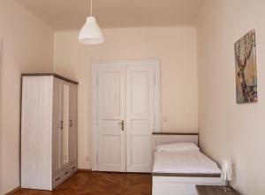 Postel nebo postele na pokoji v ubytování Welcome Hostel & Apartments Praguecentre