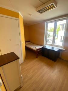 Postel nebo postele na pokoji v ubytování Telliskivi Hostel
