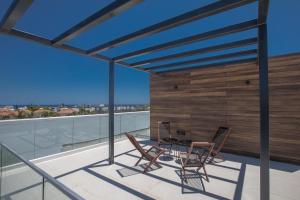 En balkon eller terrasse på Elite Pearl Villas