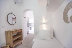 Un pat sau paturi într-o cameră la Athena's View