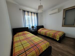 Postel nebo postele na pokoji v ubytování Poros 2 Villa + 14 fotografií