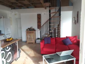 Χώρος καθιστικού στο chambre chez l habitant sur la plage les pieds dans l eau, wifi