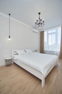 Krevet ili kreveti u jedinici u objektu SEA, central ARCADIA, lux 3 room apartment