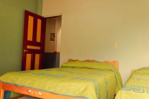 Katil atau katil-katil dalam bilik di Hotel Felicina