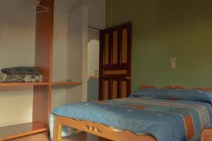Katil atau katil-katil dalam bilik di Hotel Felicina