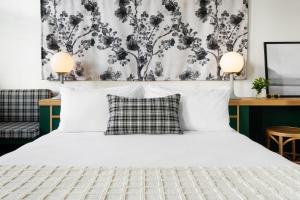 Postel nebo postele na pokoji v ubytování Hotel Grand Stark