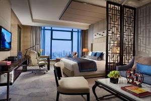 TV a/nebo společenská místnost v ubytování Tangla Hotel Tianjin