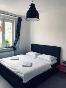 Postel nebo postele na pokoji v ubytování Apartman Kryštof