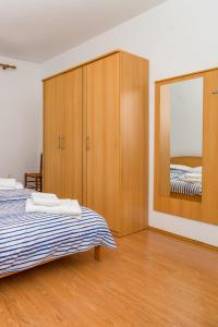 Posteľ alebo postele v izbe v ubytovaní Apartments Marina Veskovic