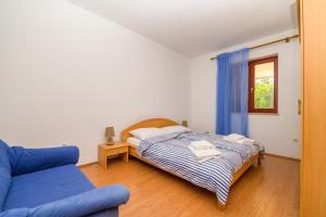 Posteľ alebo postele v izbe v ubytovaní Apartments Marina Veskovic