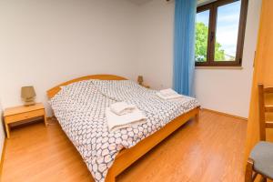 Posteľ alebo postele v izbe v ubytovaní Apartments Marina Veskovic