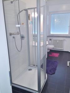 a bathroom with a shower and a toilet at Bozen - Gries in Bolzano