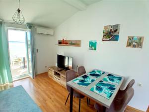 TV a/nebo společenská místnost v ubytování Apartman Šime