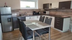 Kuchyň nebo kuchyňský kout v ubytování Apartmán Borůvka