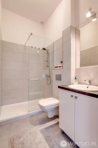 Kúpeľňa v ubytovaní Nasze Kamienice Apartament Express Rzeszów Główny