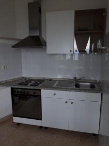 Kuchyň nebo kuchyňský kout v ubytování Villa Salyna