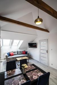 Posedenie v ubytovaní City Center Apartments Lofty z klimatyzacją