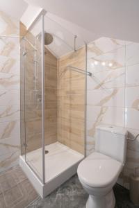 Kúpeľňa v ubytovaní City Center Apartments Lofty z klimatyzacją