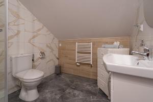 Kúpeľňa v ubytovaní City Center Apartments Lofty z klimatyzacją