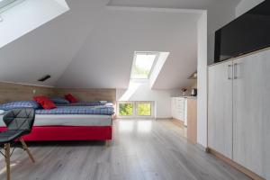 Posteľ alebo postele v izbe v ubytovaní City Center Apartments Lofty z klimatyzacją