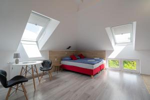 Posteľ alebo postele v izbe v ubytovaní City Center Apartments Lofty z klimatyzacją