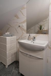 Kúpeľňa v ubytovaní City Center Apartments Lofty z klimatyzacją
