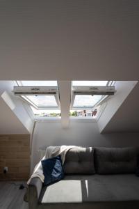 Posedenie v ubytovaní City Center Apartments Lofty z klimatyzacją