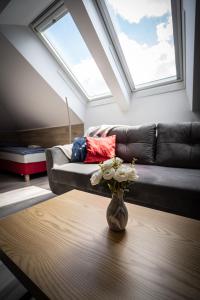 Posedenie v ubytovaní City Center Apartments Lofty z klimatyzacją