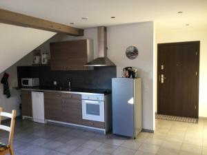 Kuchyň nebo kuchyňský kout v ubytování Appartement cosy à Lohr, 45 m² avec parking inclus + 4 fotografie
