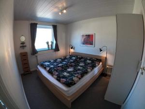 Postel nebo postele na pokoji v ubytování Thy Ferielejlighed