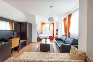 TV a/nebo společenská místnost v ubytování Hotel Venezia