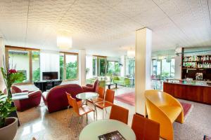 TV a/nebo společenská místnost v ubytování Hotel Venezia
