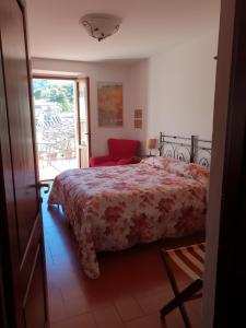 Posteľ alebo postele v izbe v ubytovaní Albergo Giovanni Da Verrazzano