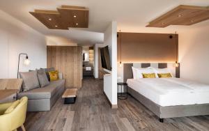 Posteľ alebo postele v izbe v ubytovaní Pippos Mountain Lodge