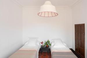 A bed or beds in a room at Finca El Azahar