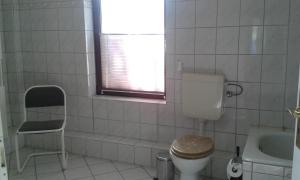 Koupelna v ubytování Ferienhaus - Roggentin + 8 fotografií