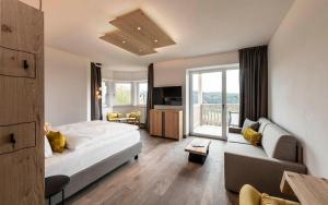 Posteľ alebo postele v izbe v ubytovaní Pippos Mountain Lodge