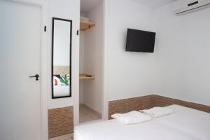 Postel nebo postele na pokoji v ubytování Salitre Rooms