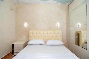 Ένα ή περισσότερα κρεβάτια σε δωμάτιο στο KAOM Lux +68 φωτογραφίες