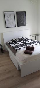 Posteľ alebo postele v izbe v ubytovaní Apartament z widokiem